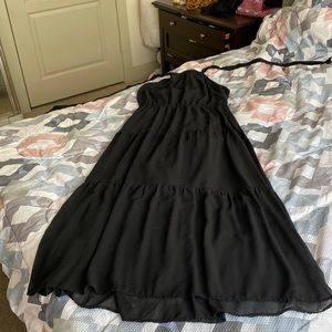 Long black super cute halter dress.